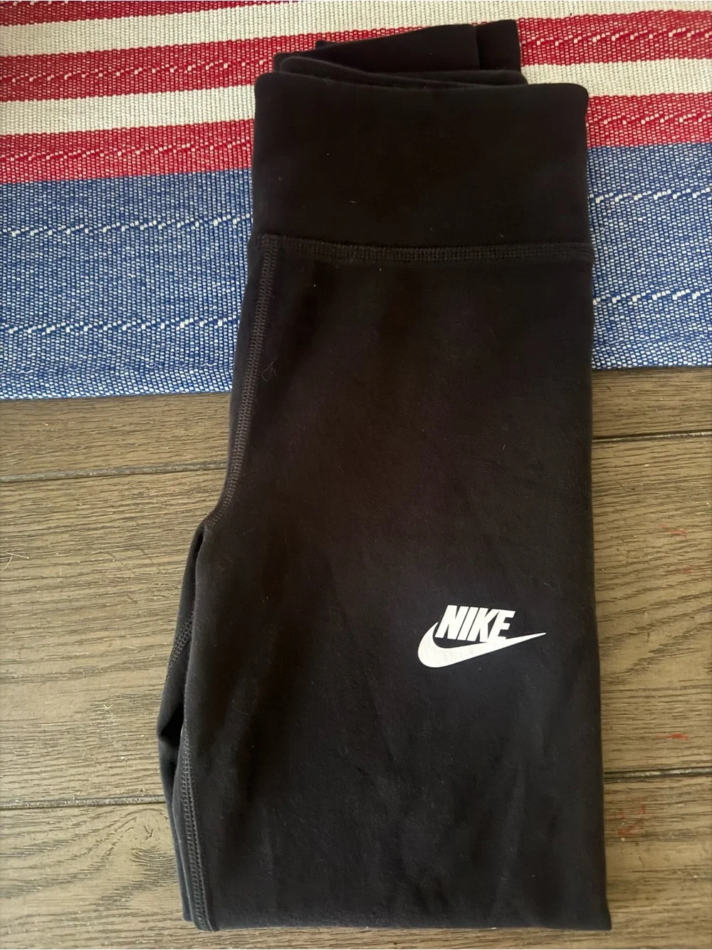 Nike Black Apparel Item with White Swoosh